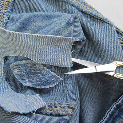 Repriser ou réparer des trous sur un jeans